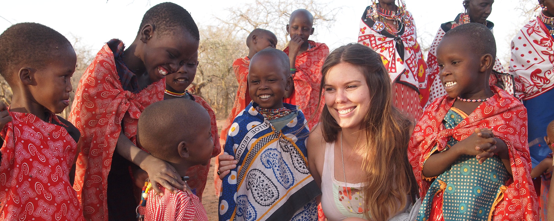 Cath making friends with children in the Maasai village near Amboseli Porini