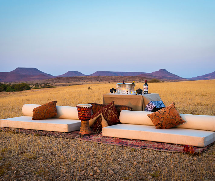 Desert Rhino Camp in Damaraland contributes directly to the Save the Rhino Trust, a lifeline for the region's endangered black rhino.