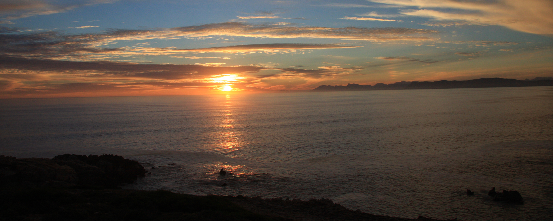 Sunset paradise: another beautiful day in Walker Bay along the Whale Coast.