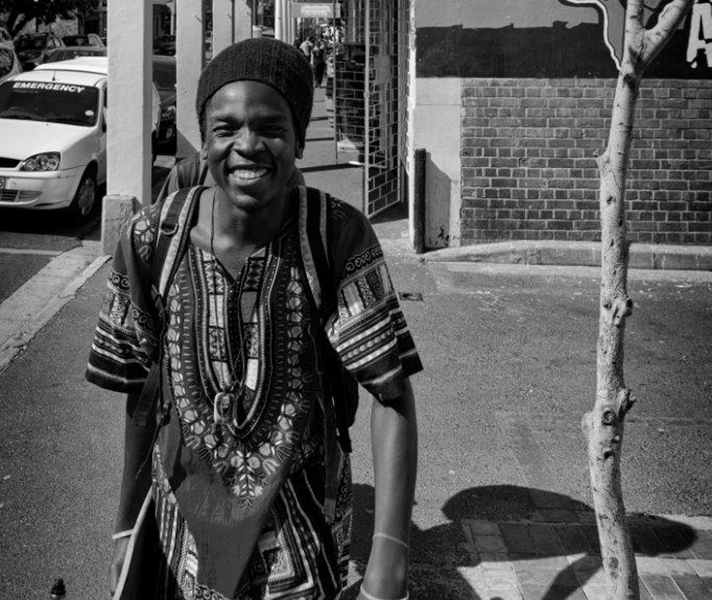 ‘When this guy saw me taking his photograph, he adopted a serious and flashy “hip-hop gangster” pose. I dropped the camera and this genuine and naturally happy smile was my reward.’