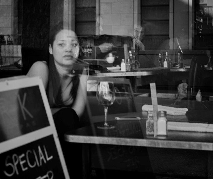 ‘I shot this without using the viewfinder. Who is she waiting for?’