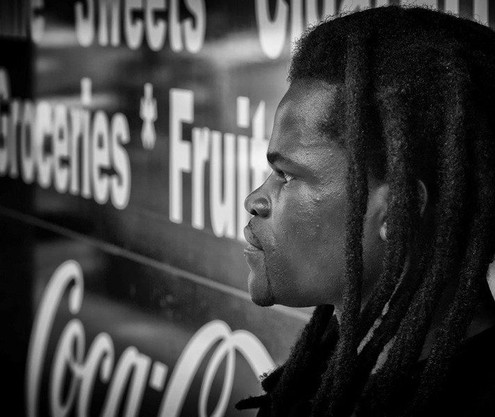 ‘This man was watching the comings and goings on Long Street intensely. Nice dreads too.’