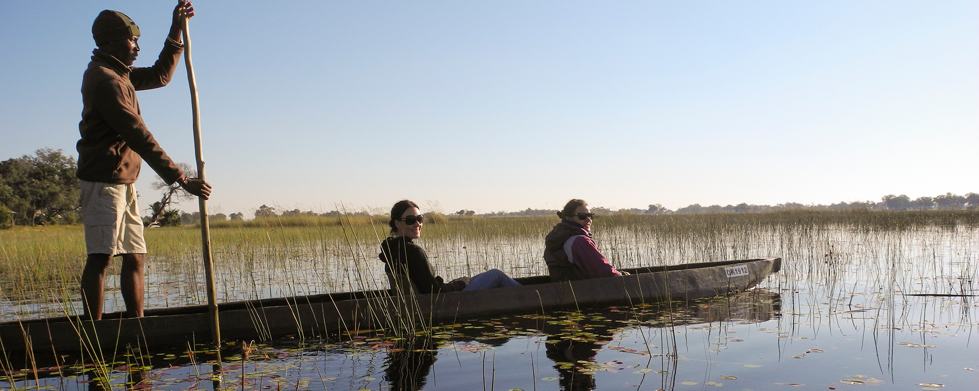 The classic delta experience: gliding past lilies in a mokoro.
