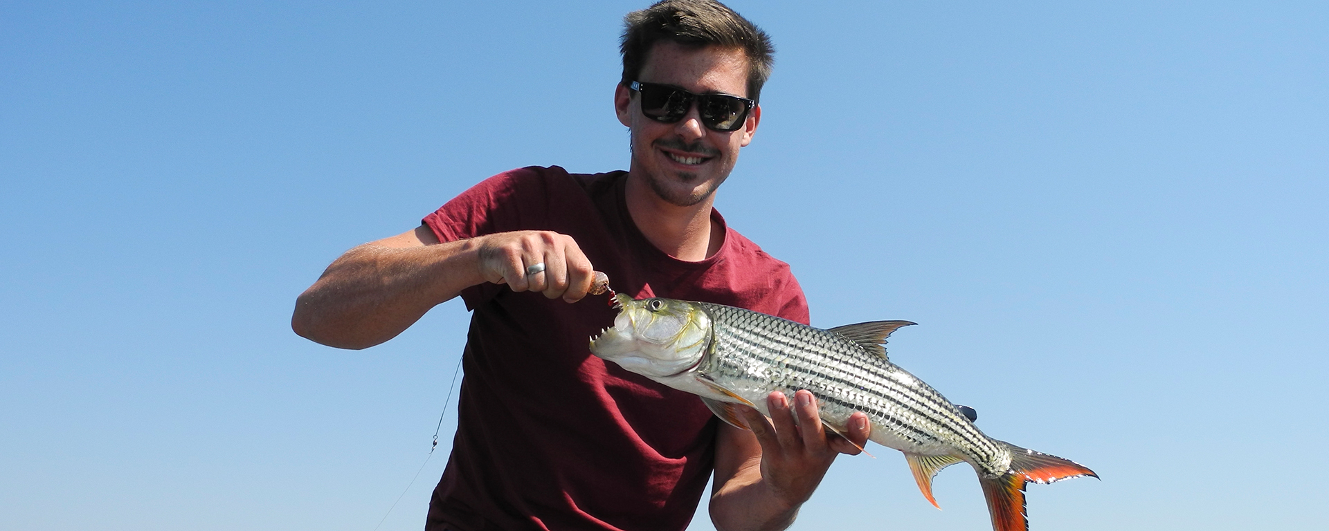 Nicholas with one of his 10 catch-and-release tigerfish!