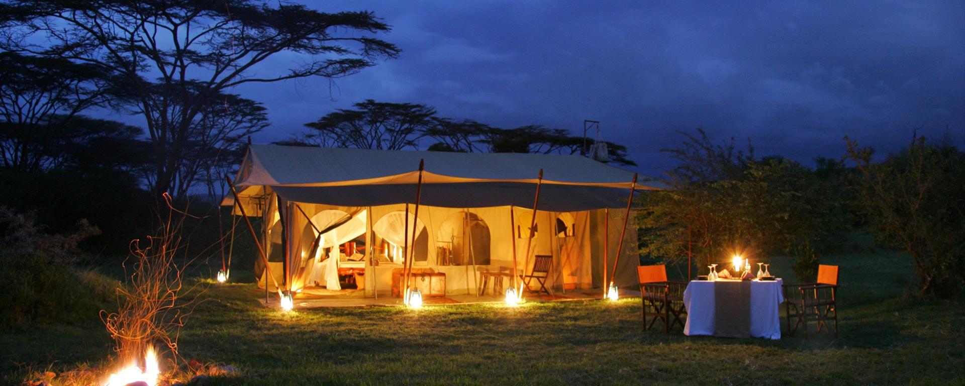 With the cozy glow of lanterns & a campfire at Saruni Wild, who needs electricity?