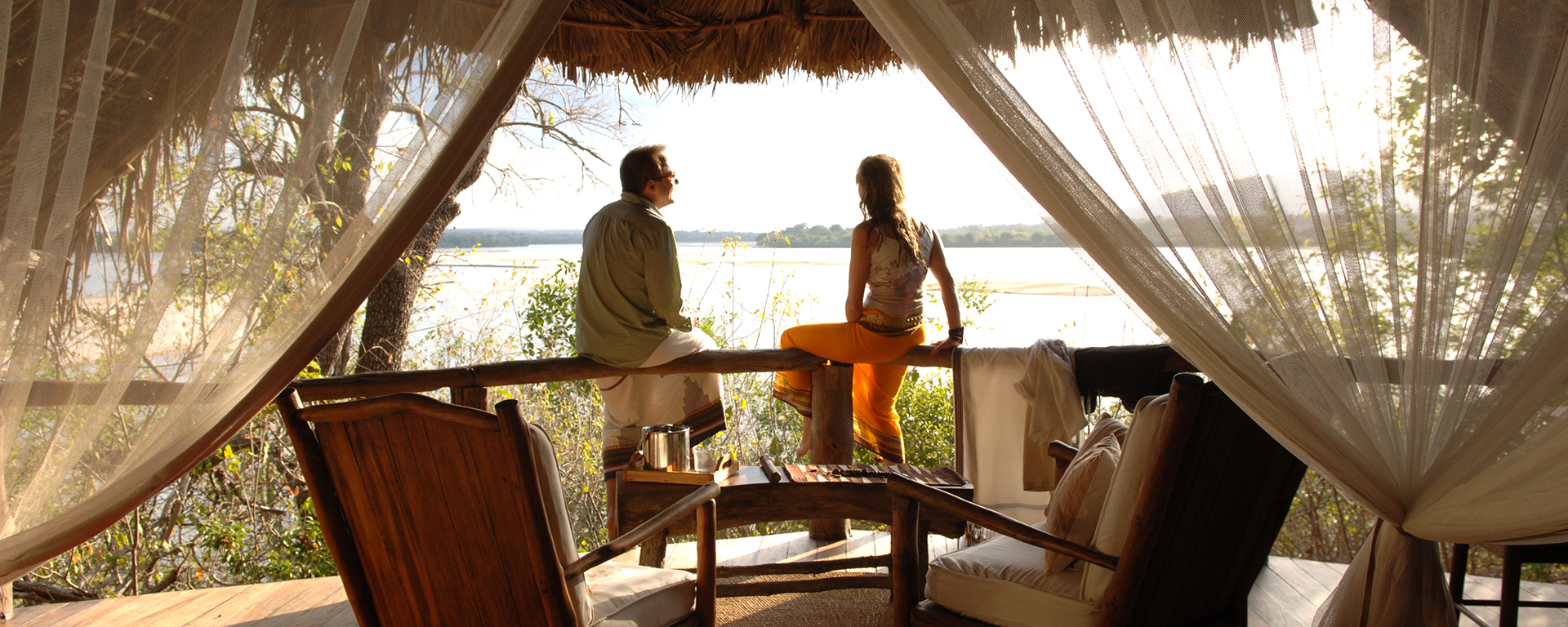 Wake up to the sun dancing on the Rufiji River in Selous National Park.