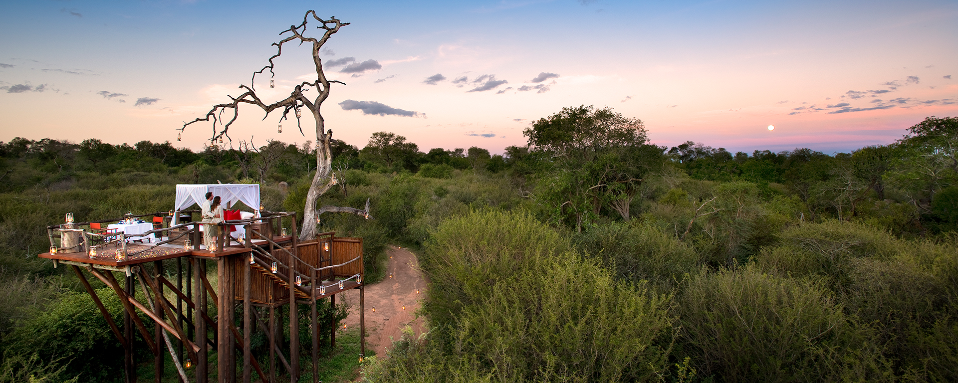It's all flowing mosquito nets, soft linens & private dinners at Chalkley Treehouse at Lion Sands.