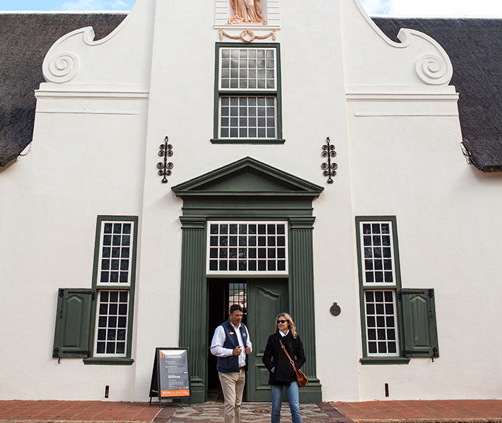 The original manor house at Groot Constantia is now a museum while the tasting room stocks an excellent selection of vintages.