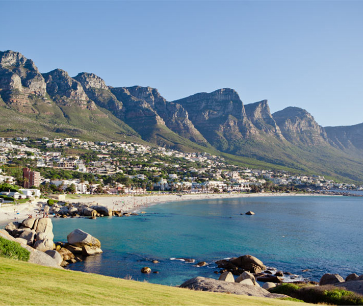 Cape Town's Camps Bay beach is banked by the Twelve Apostles mountain range, making it one of the most beautiful in South Africa.