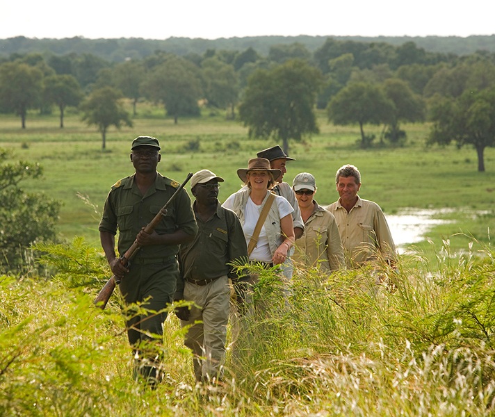 Guests & trained guides on a walking safari at Puku Ridge in the South Luangwa National Park - a highlight of any trip to this region.