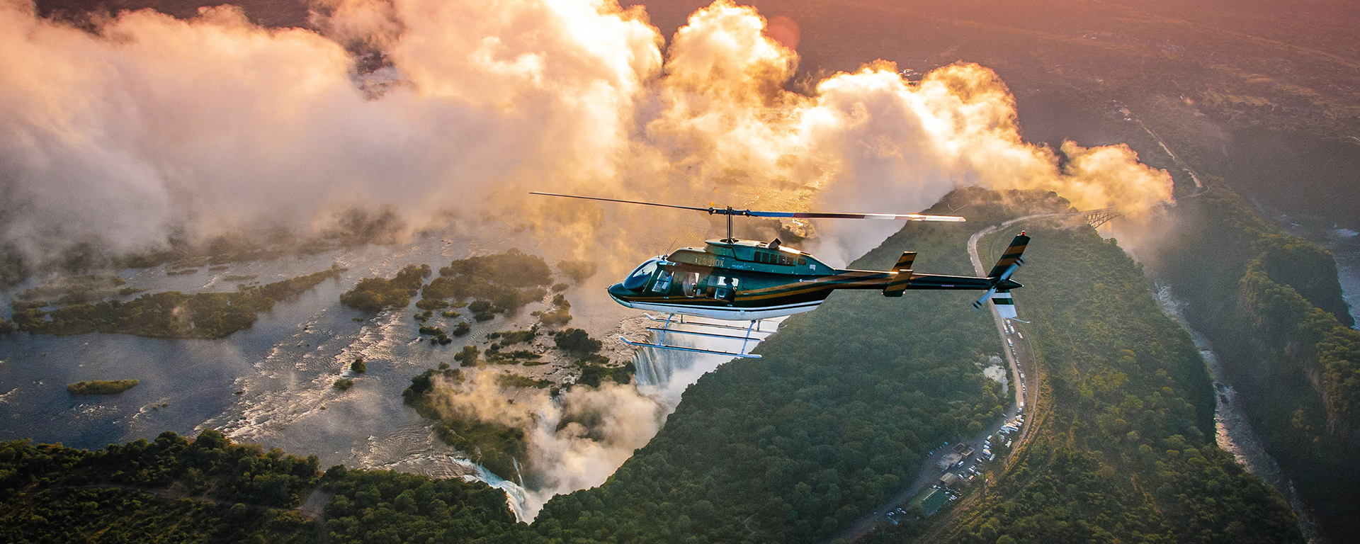 A helicopter flip is an exciting way to appreciate the vastness of Mosi-oa-Tunya, the traditional name for Victoria Falls.