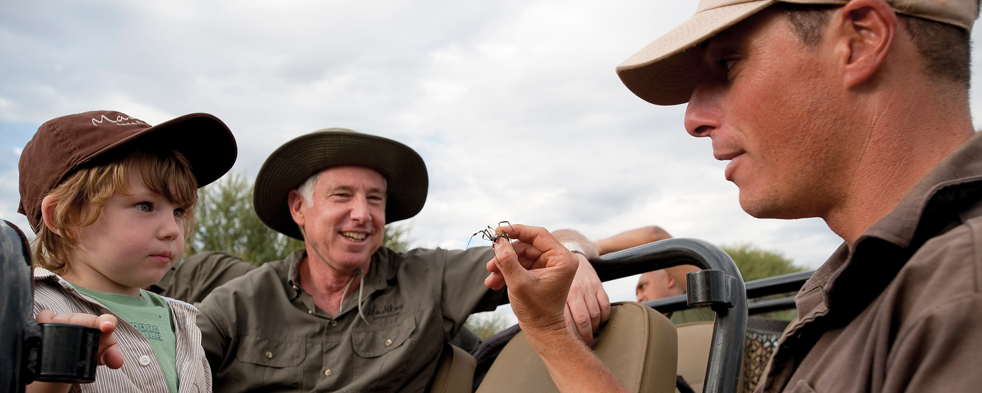 Getting to grips with spiders at Madikwe Safari Lodge...