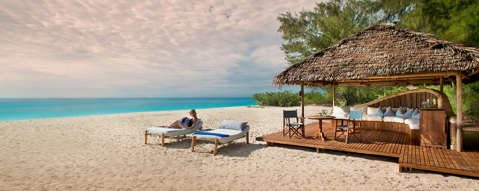Mnemba Island in Zanzibar offers all the makings of a dream beach getaway - luxury, aquamarine waters, seafood, scuba & more.