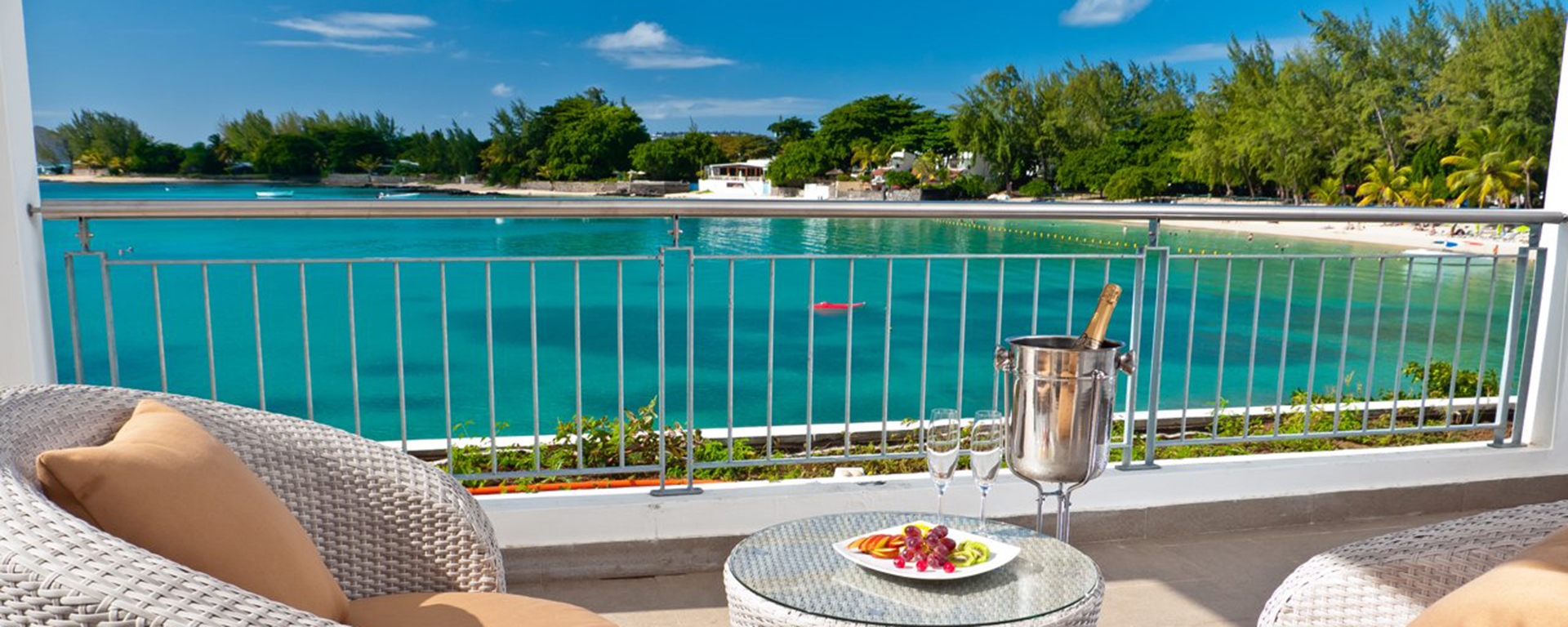 Infinity Villa overlooks Mauritius's deep turquoise ocean from its sun-drenched terrace.