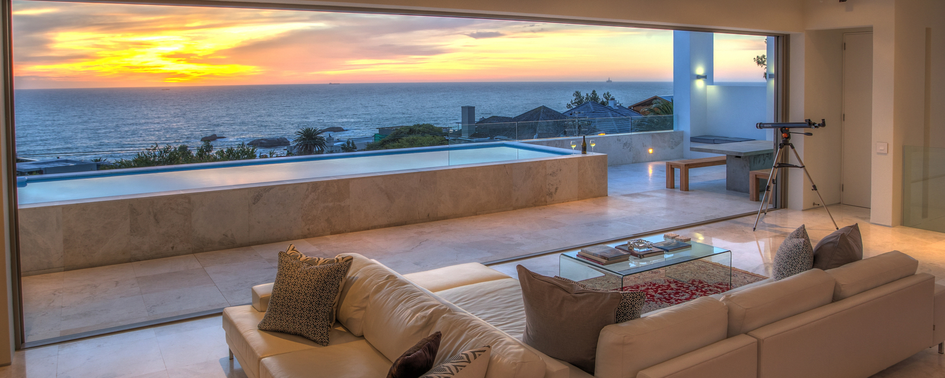 The Atlantic Seaboard is known for having Cape Town's best views of the sunset - enjoy them from your expansive balcony at Brightside Villa in vibrant Camps Bay.