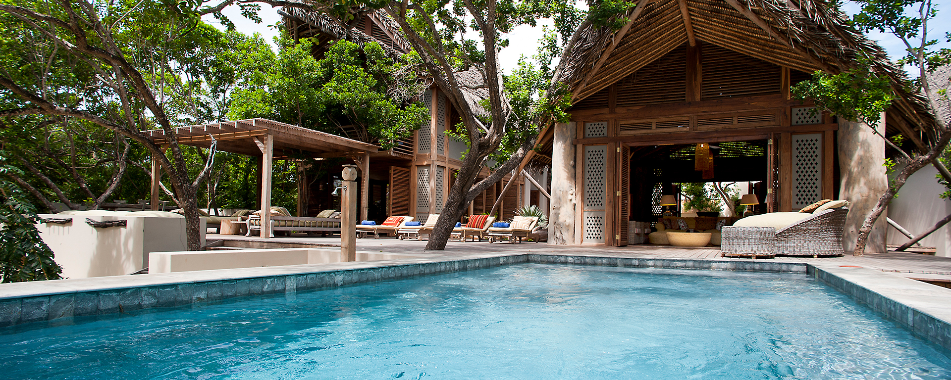 At Villa Suluwilo, the lattice design and high ceilings allow cooling ocean breezes to flow through the house.