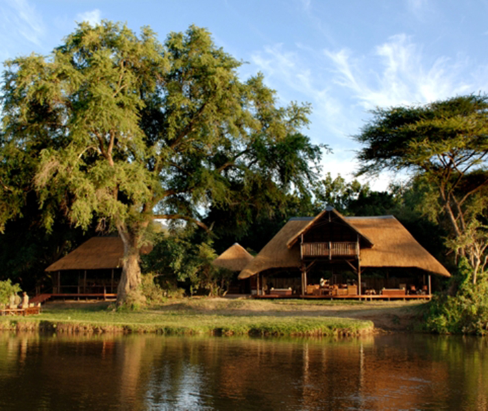 On the banks of the Lower Zambezi River, award-winning Chiawa Camp is perfect for canoe safaris.