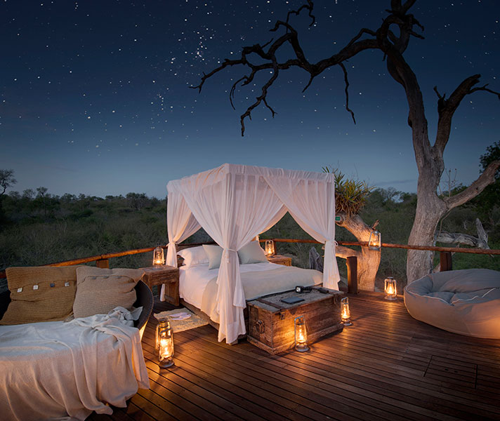 Lion Sands has a collection of astonishing treehouses that allow you to sleep on a high platform under the stars.