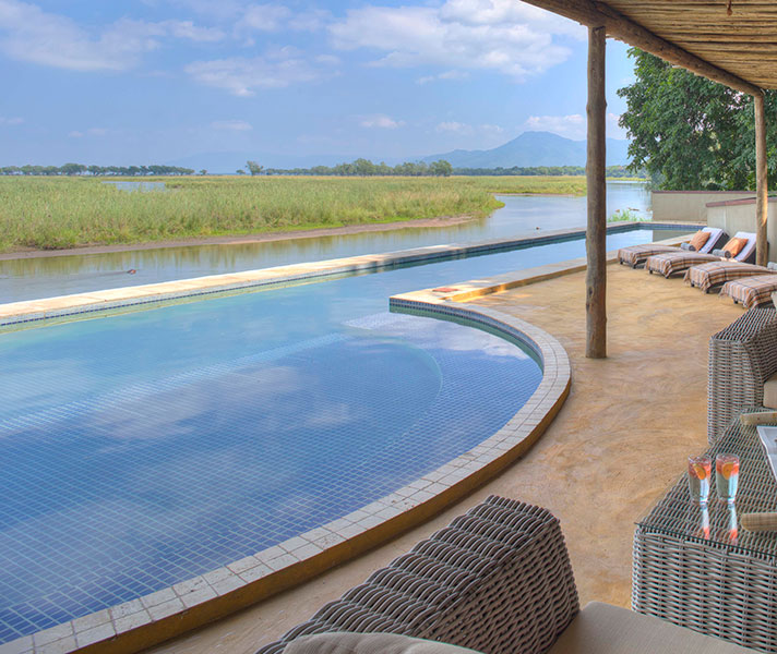 The infinity lap pool at Sausage Tree Camp is solar heated and you don’t have to miss any of the river action while having a dip!