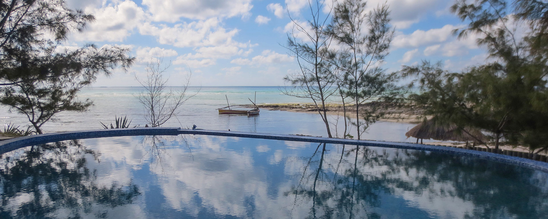 This is a beach vacation so pack you bathing costume so you can make the most of Coral Lodge’s pool with a view…
