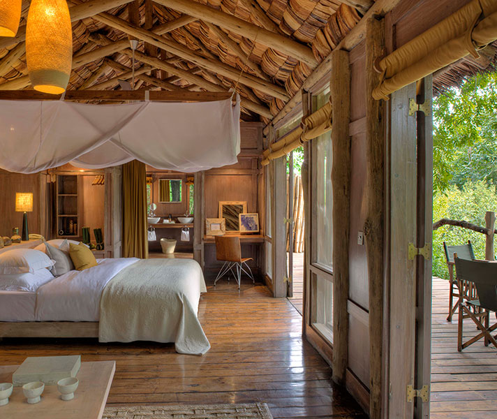 Lake Manyara Tree Lodge’s delightful treehouses are elegantly furnished and offer unique views of the forest canopy.