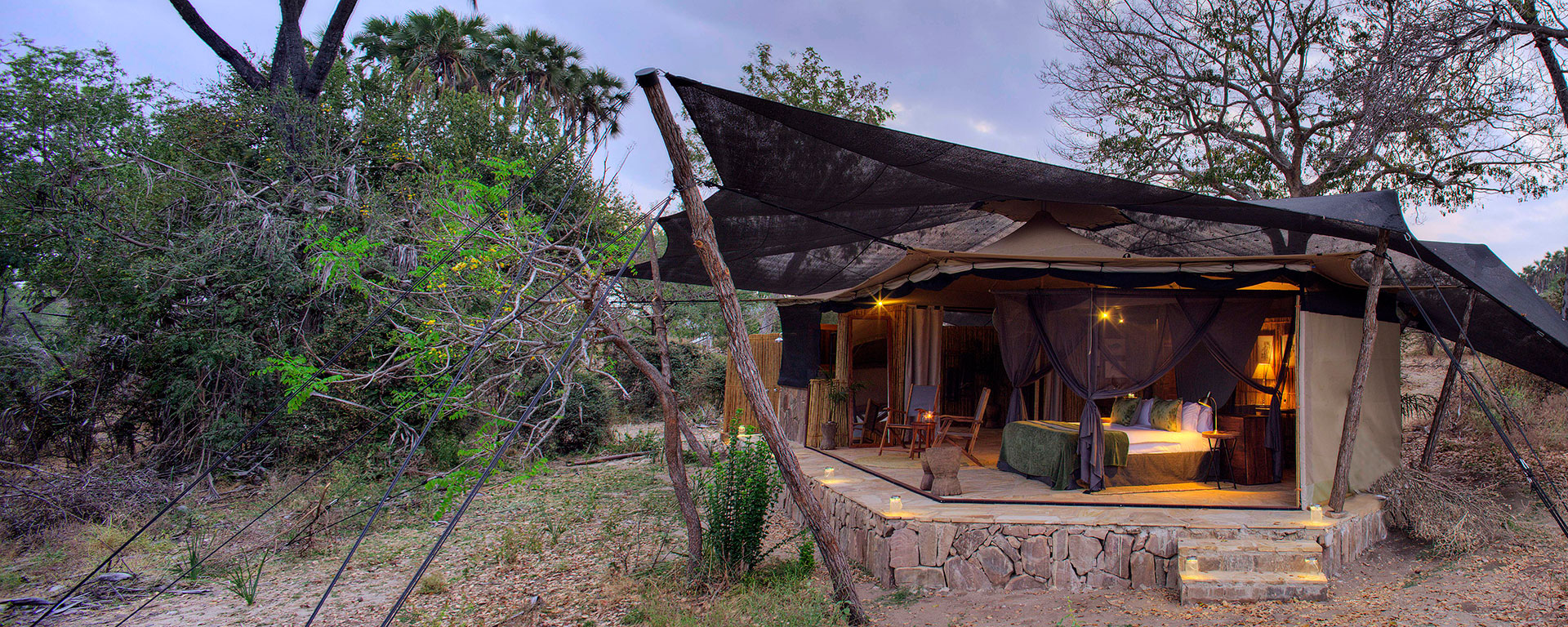 The tented suites at Roho Ya Selous have attractive designs of natural materials, neutral colours and modern comforts.