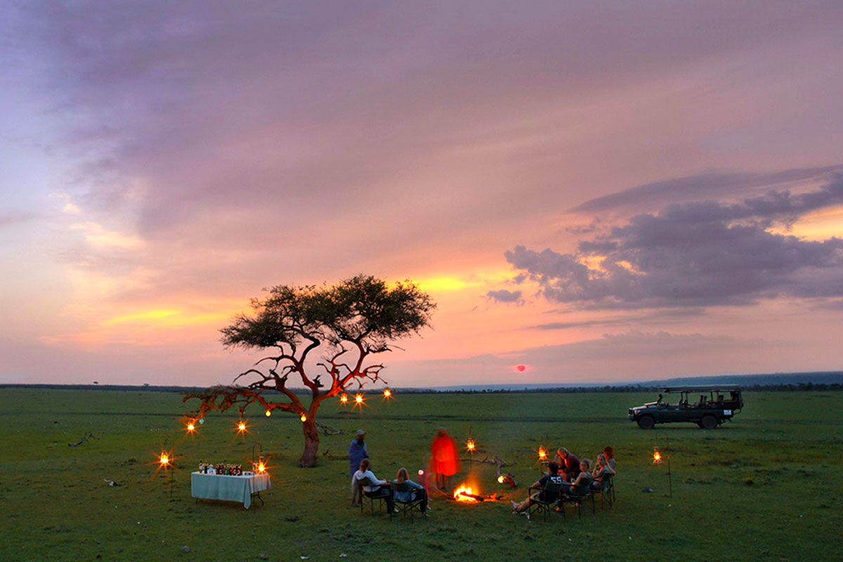 Enjoying sundowners on a private conservancy in the Masai Mara National Reserve